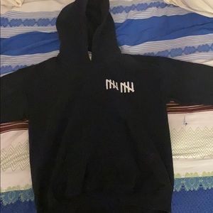 This is a black team 10 hoodie